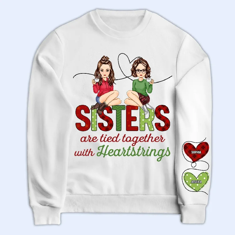 Sisters Are Tied Together With Heartstrings - Christmas Gift For Besties, Sisters - Personalized Sweatshirt With Sleeve Imprint